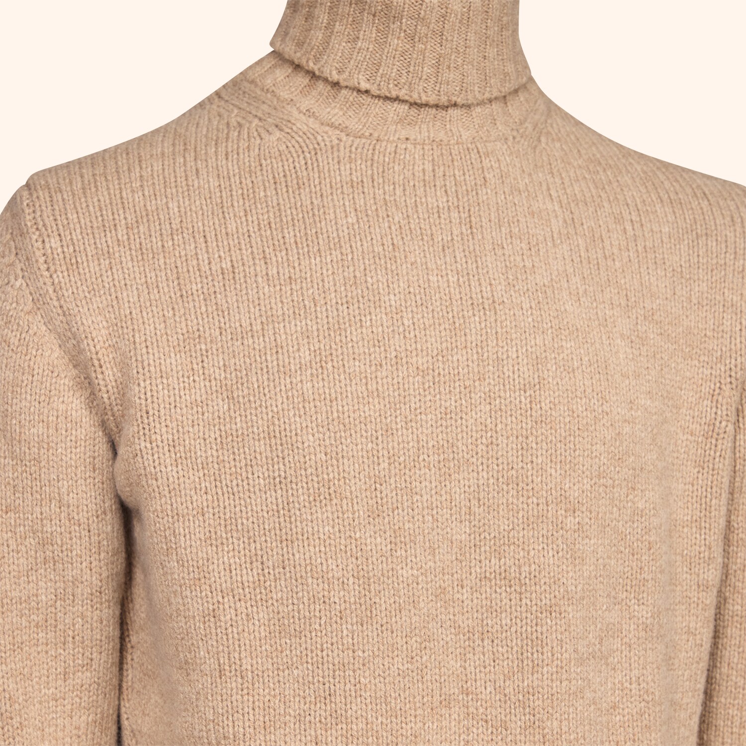Pull col roulé
